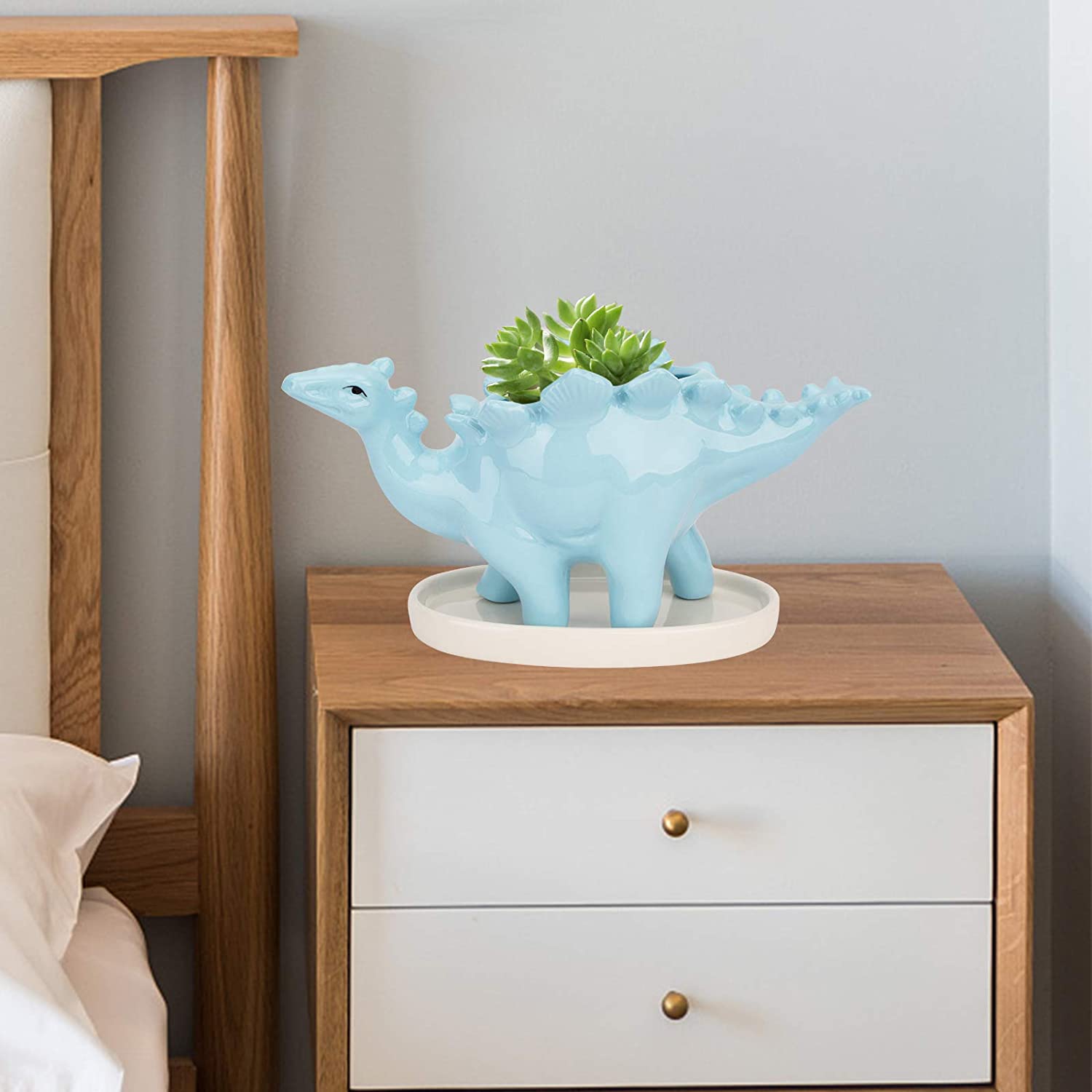 Mini maceta con forma de dinosaurio